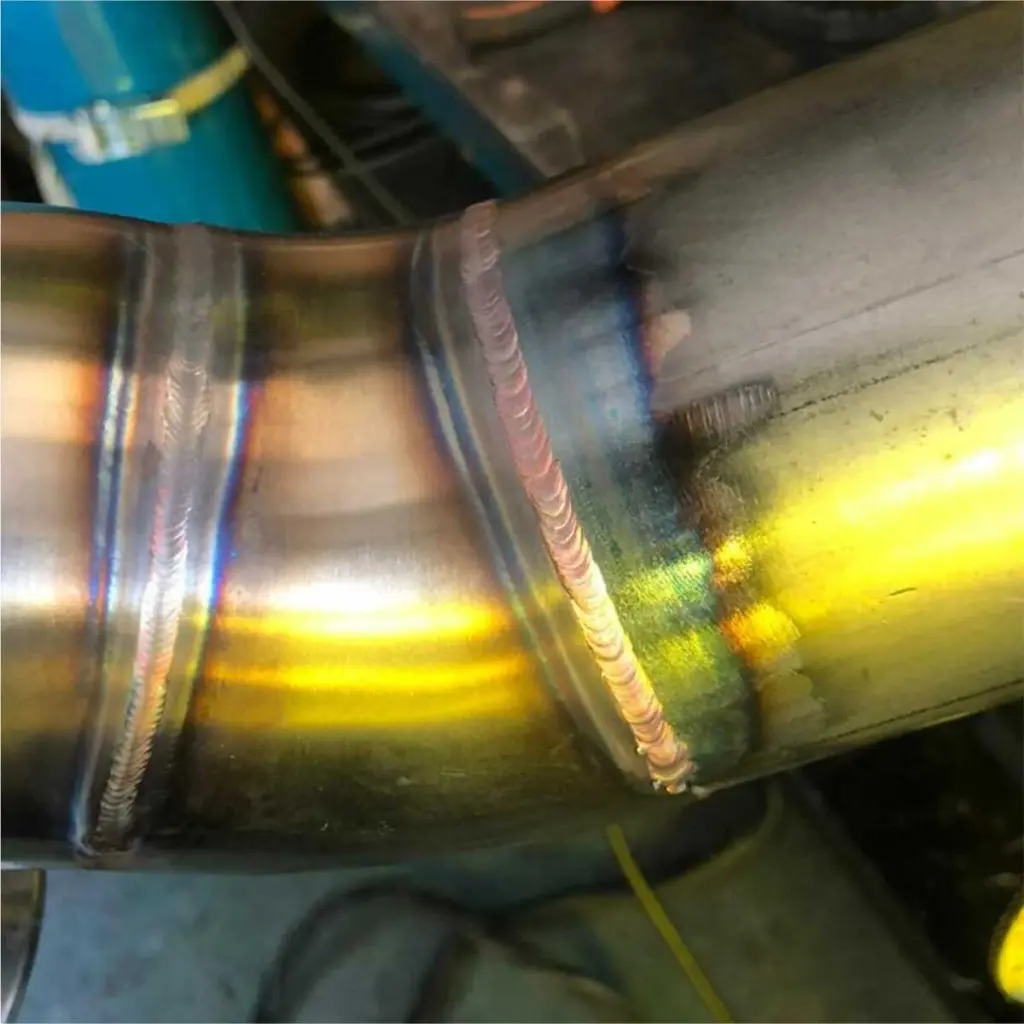 Close-up of a welded exhaust pipe bend