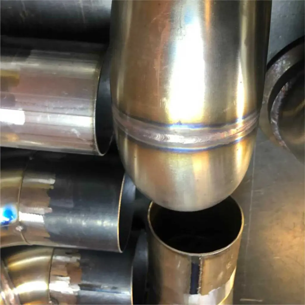 Stainless steel exhaust sections in the workshop